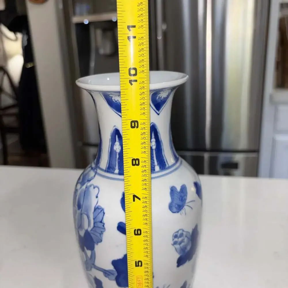 Vintage Blue and White Floral Porcelain Vase with Butterfly Motif